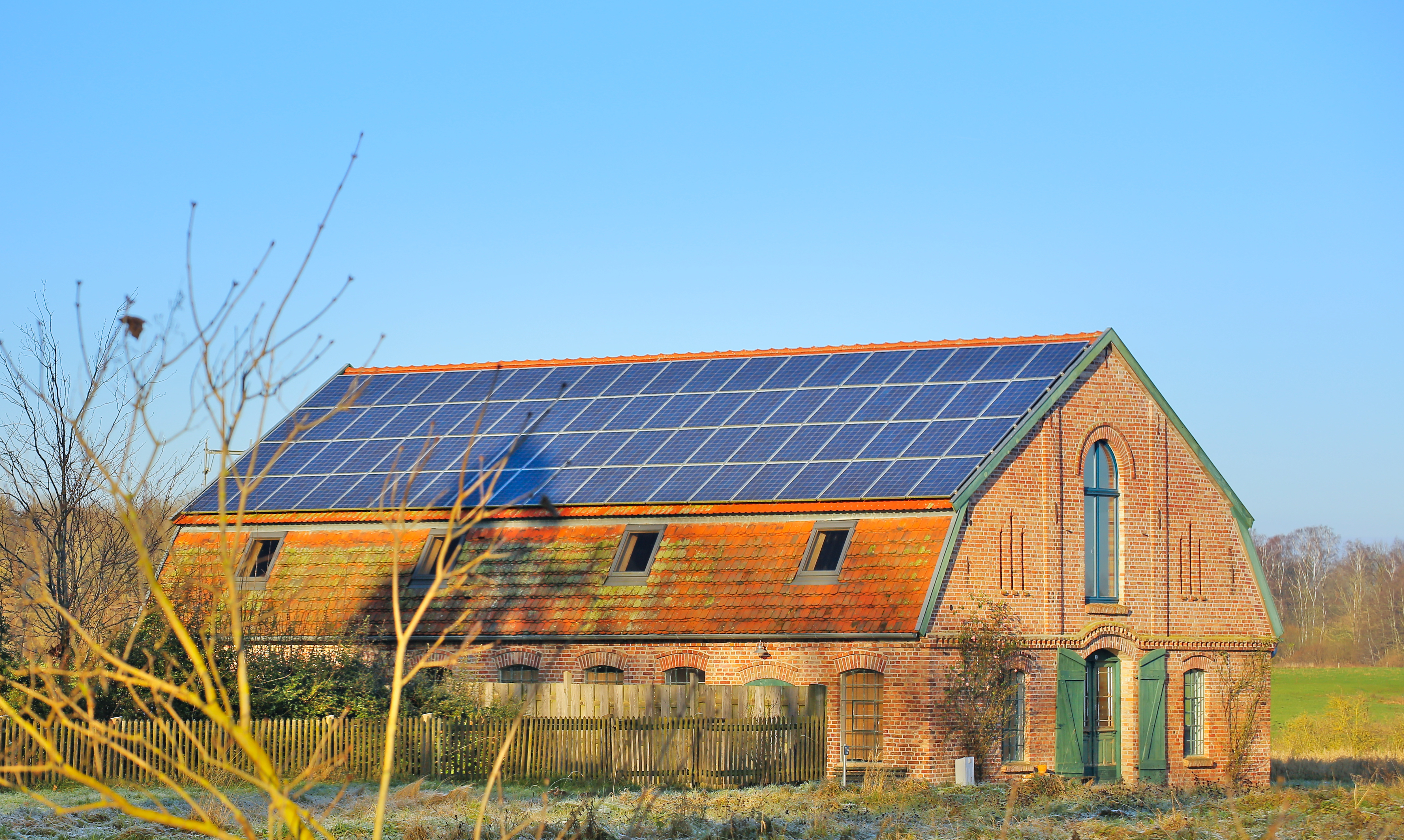 Old farmhouse with solar panels
