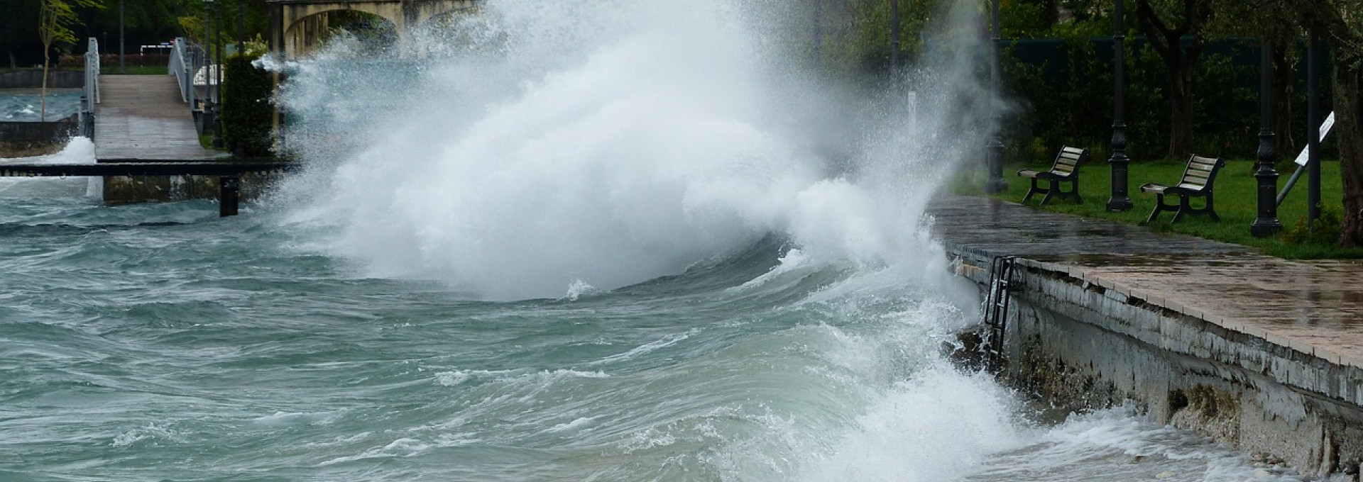 Big wave crashing against seafront