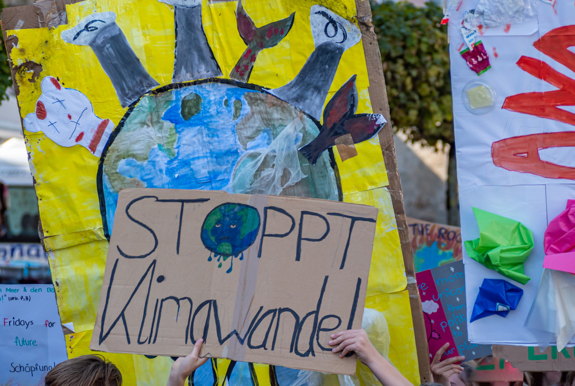 Klimaangst Schild "Stoppt Klimawandel"